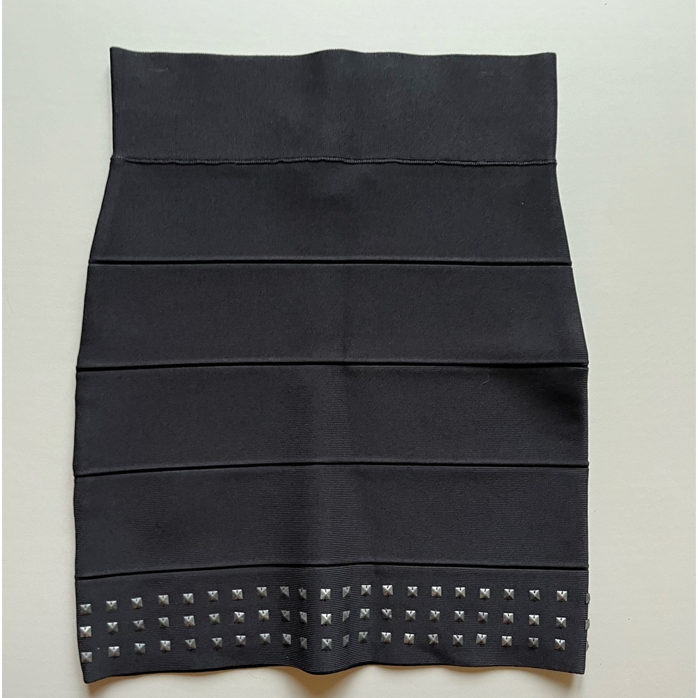 BCBG NW Black Bandage Skirt with metal detail hem.